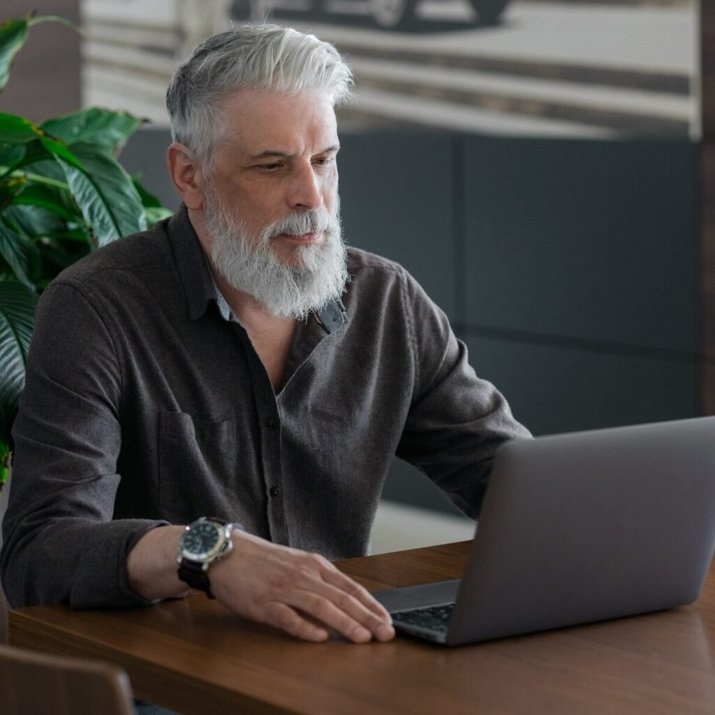 a handsome man with gray hair and a watch on his h 2023 11 27 04 49 11 u e1719306366650 1