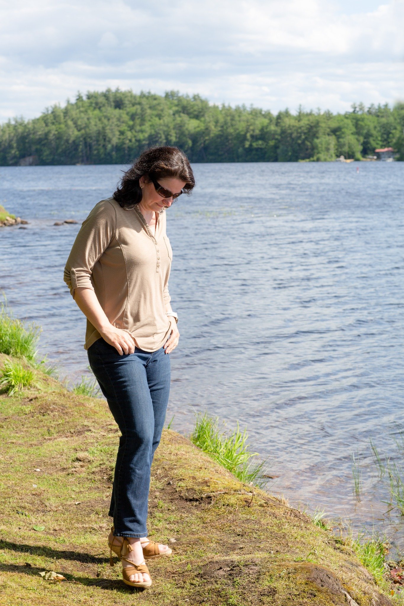 Dr. Karolina LaBrecque walking along the water outdoors