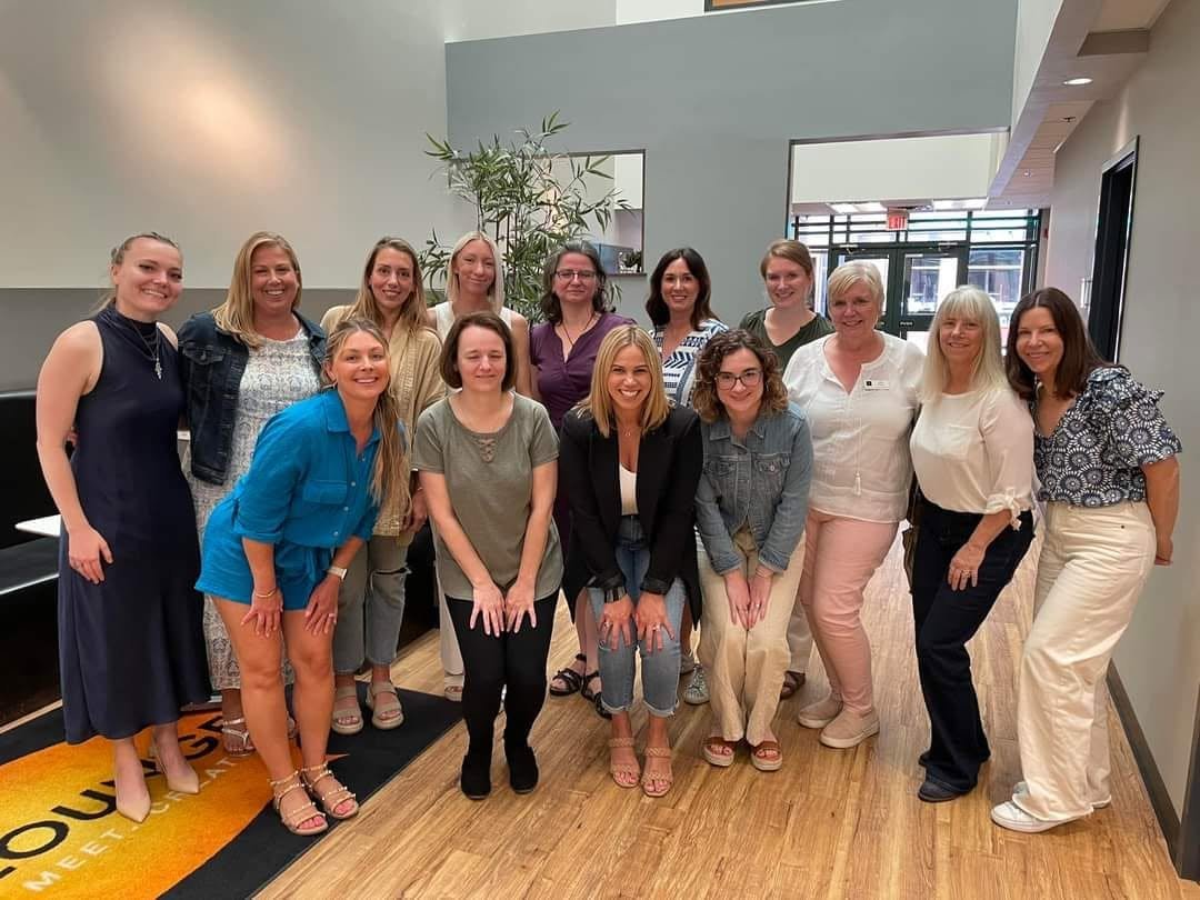Dr. Karolina LaBrecque with a group of women at a networking event